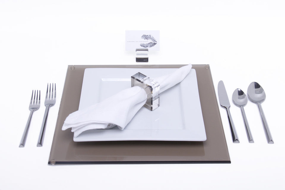 Alexandra Von Furstenberg Acrylic Square Placemat set in Bronze with table setting including acrylic napkin ring and acrylic place card holder 
