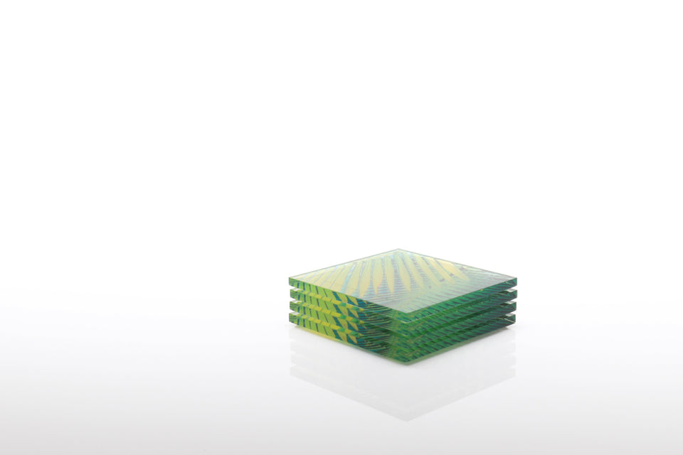 Alexandra Von Furstenberg Acrylic lucite square drink coasters in Palm Print stacked in a pile set of 4