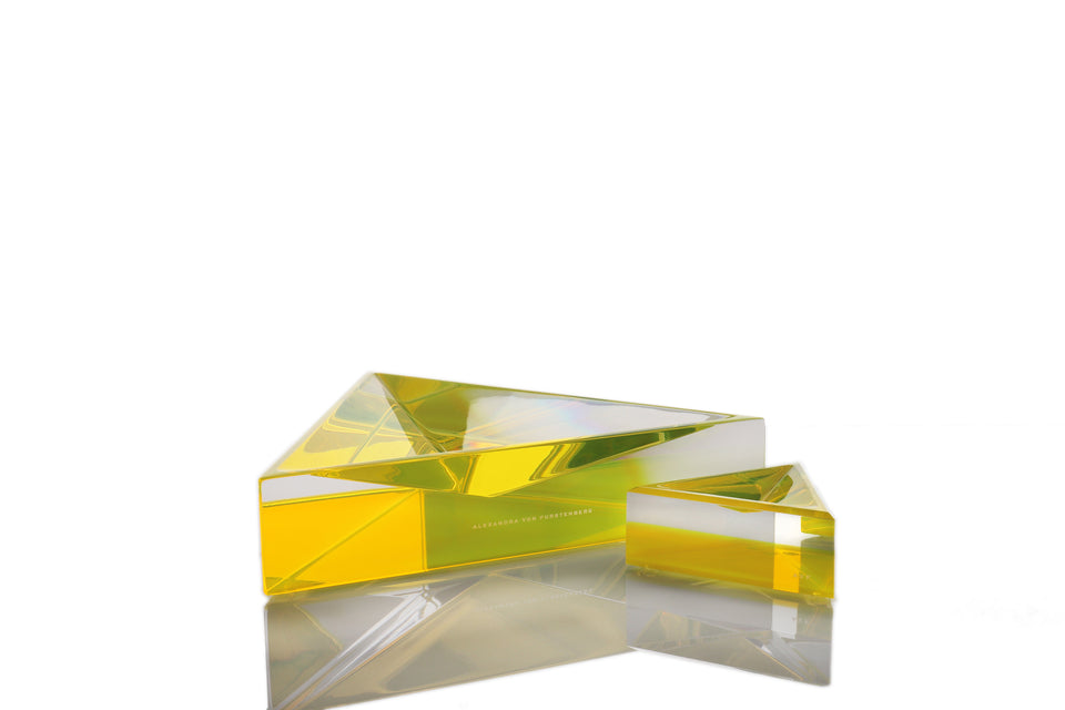 Alexandra Von Furstenberg Triangle shaped Acrylic Delta dish in color yellow with small size dish next to it. 