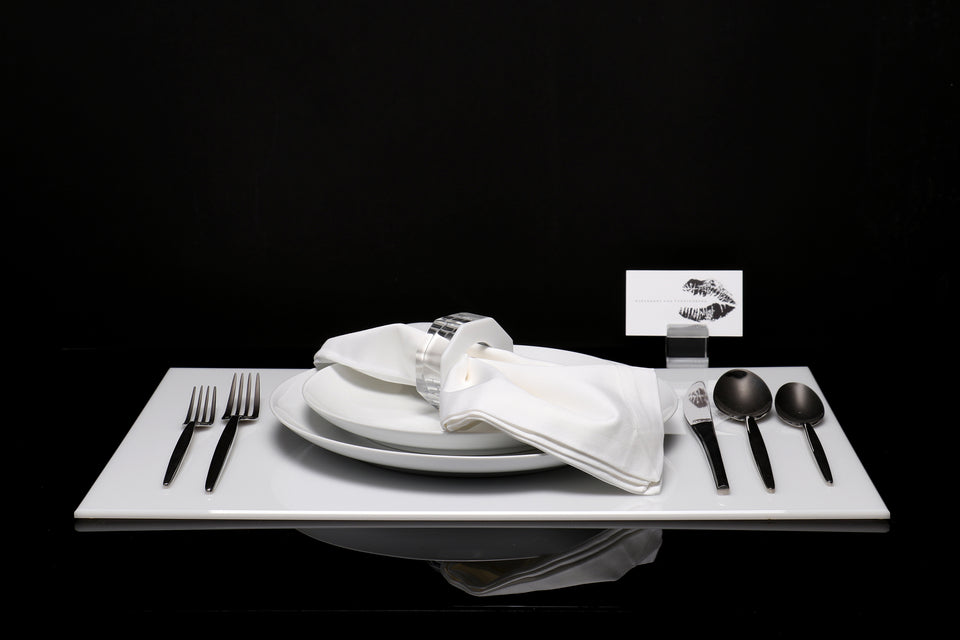 Alexandra Von Furstenberg Acrylic Rectangle Placemat set in white with table setting including acrylic napkin ring and acrylic place card holder 