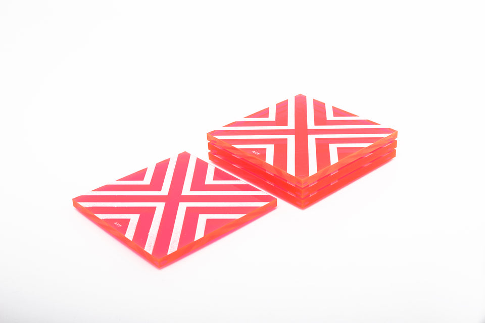Alexandra Von Furstenberg Acrylic lucite square chevron drink coasters in pink stacked in a pile set of 4