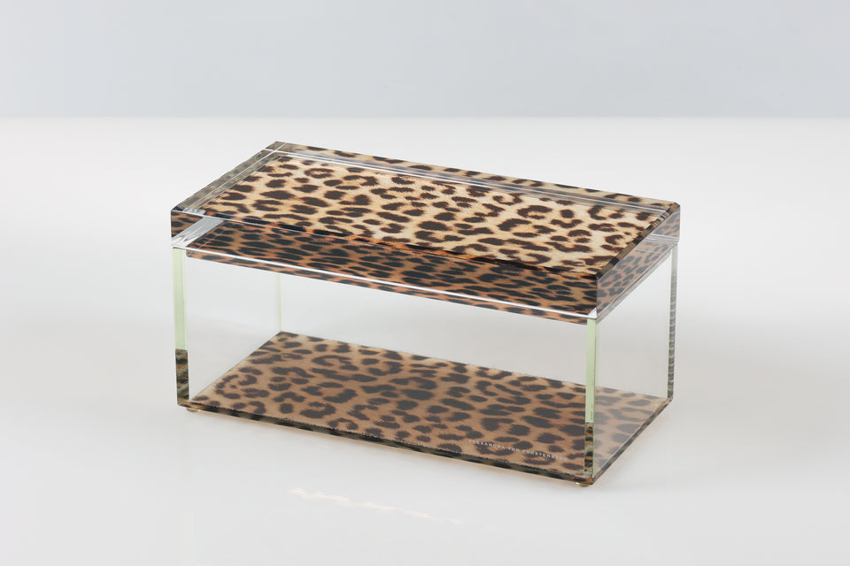 Clear acrylic box with leopard print pattern on a white background