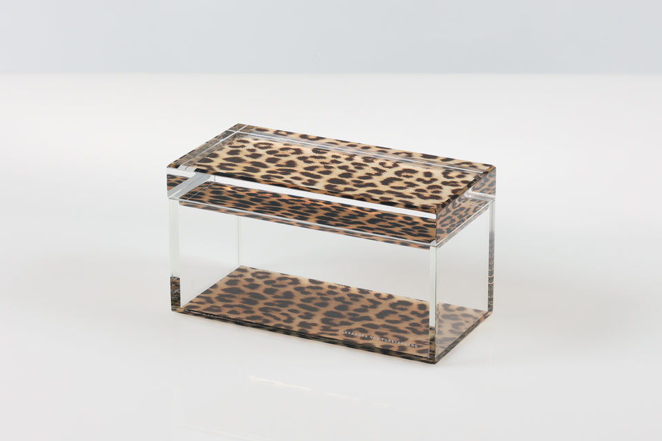 Clear acrylic box with leopard print pattern on a white background