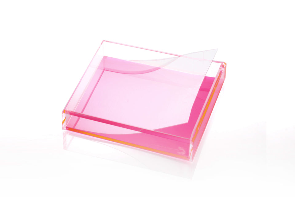 A clear plastic liner designed to fit inside a pink tray, displayed against a white background. Square. 