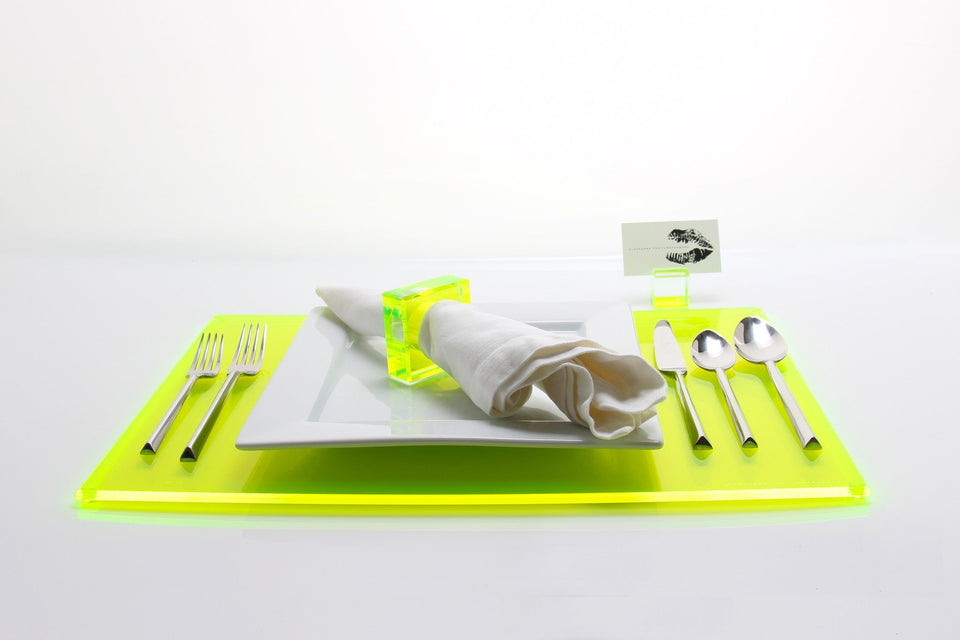 Alexandra Von Furstenberg Acrylic Rectangle Placemat set in Green with table setting including acrylic napkin ring and acrylic place card holder 