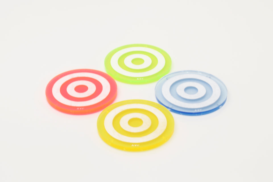 Alexandra Von Furstenberg Acrylic lucite round bullseye drink coasters in green stacked in a pile set of 4