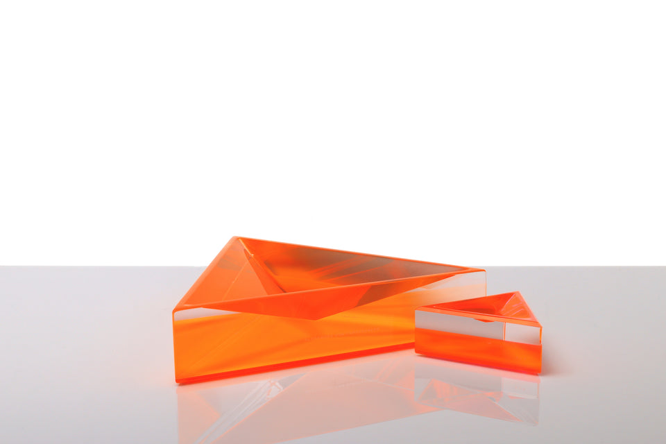 Alexandra Von Furstenberg Triangle shaped Acrylic Delta dish in color orange with small size next to it. 