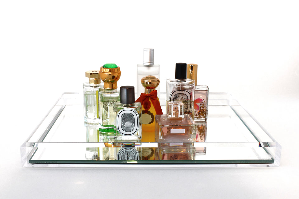 Alexander Von Furstenberg Vanity Mirror Acrylic Tray in Clear with perfume bottles on tray