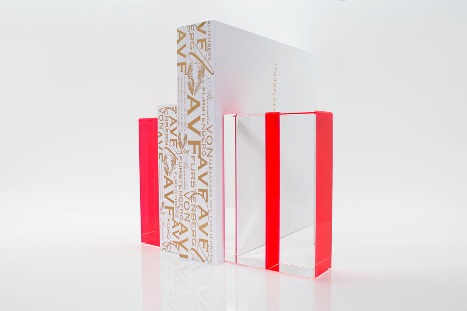 Alexandra Von Furstenberg Acrylic Block Chapter Bookends in Red color showing books in between. 