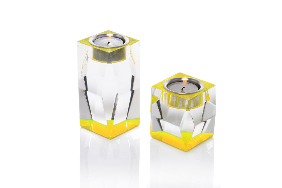Pair of Alexandra Von Furstenberg Acrylic Lucite Votive Tea Light Candleholders in yellow. One short one tall