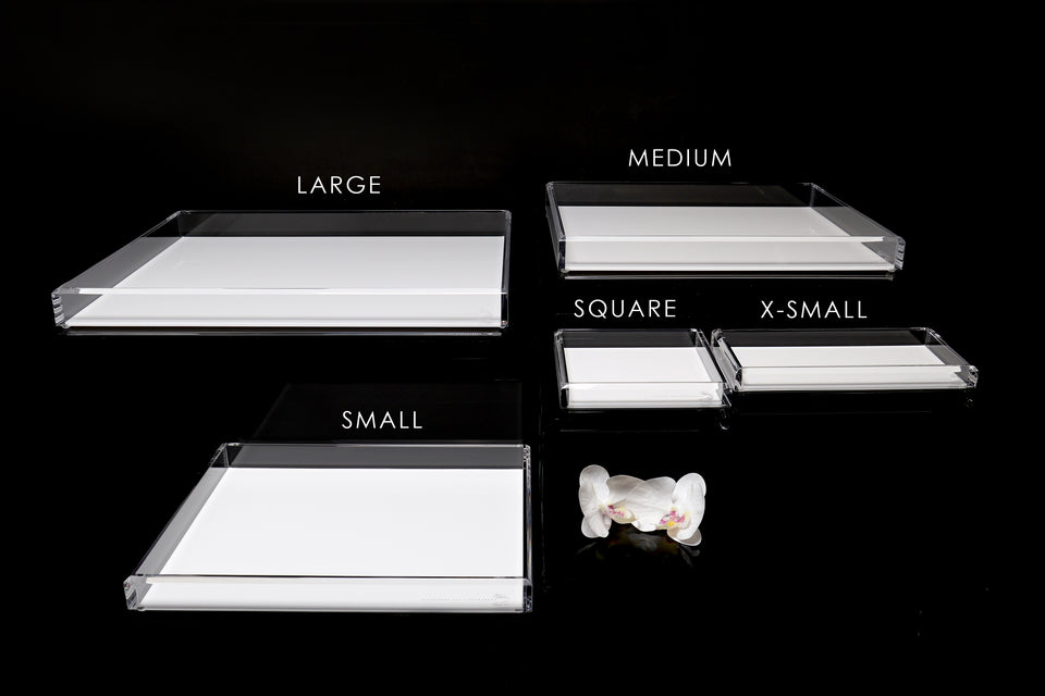 Alexandra Von Furstenberg Acrylic decorative trays in white showing all available sizes.