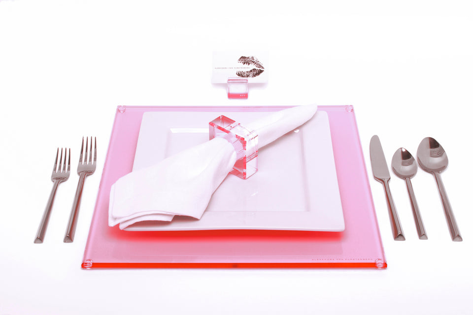 Alexandra Von Furstenberg Acrylic Square Placemat set in Rose with table setting including acrylic napkin ring and acrylic place card holder 