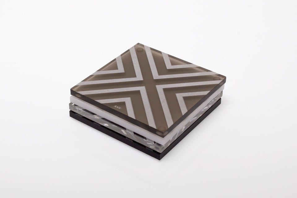 Alexandra Von Furstenberg Acrylic lucite square chevron drink coasters in multi color stacked in a pile set of 4