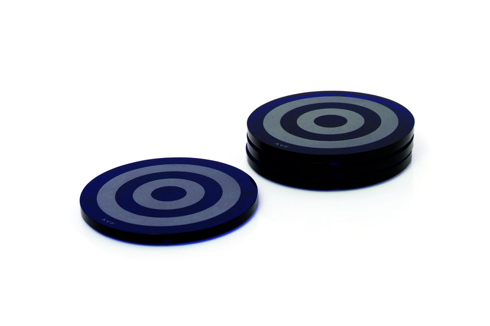 Alexandra Von Furstenberg Acrylic lucite bullseye drink coasters in sapphire stacked in a pile set of 4